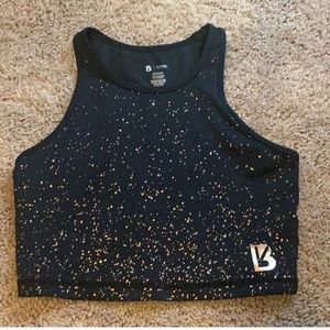 Buff bunny aurora top in black and gold rose print